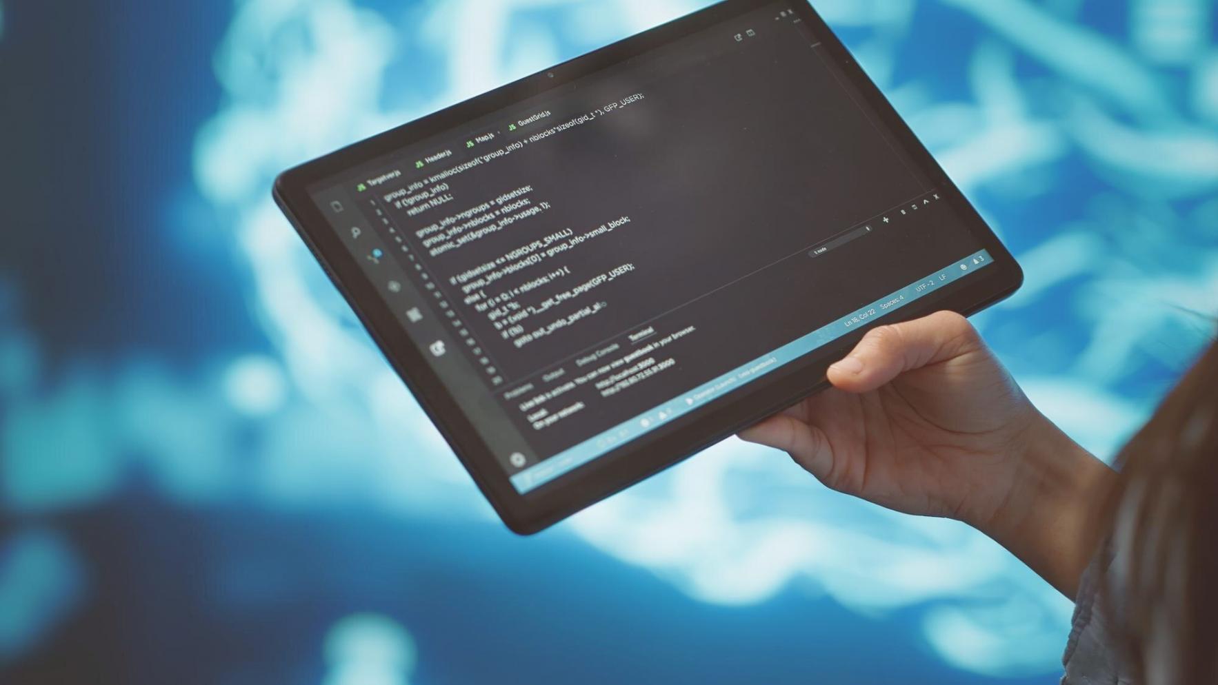 Students working on database projects in a collaborative learning environment