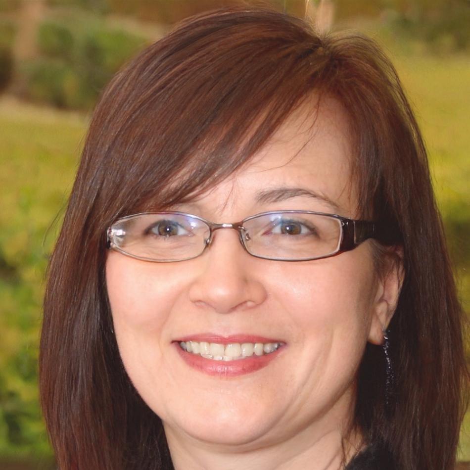 Database developer analyzing complex query optimization results on multiple screens